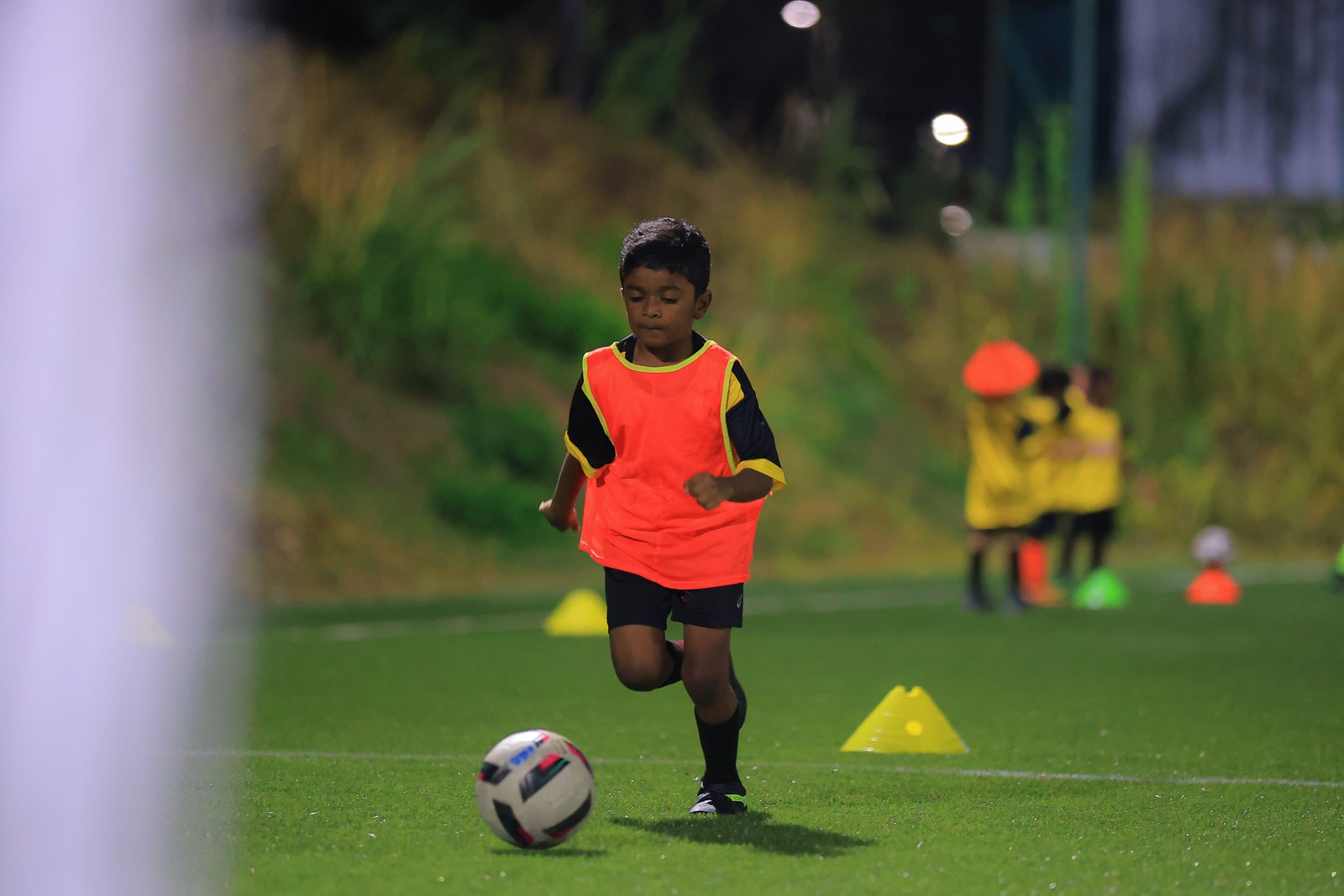 Training drill with orange bib